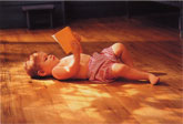 Baby on heated hardwood floor.
